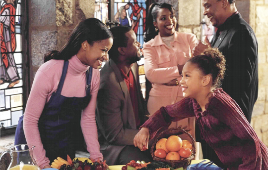 a group of people sitting at a table